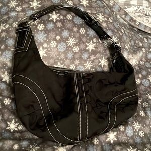 Coach hobo bag with matching wallet.